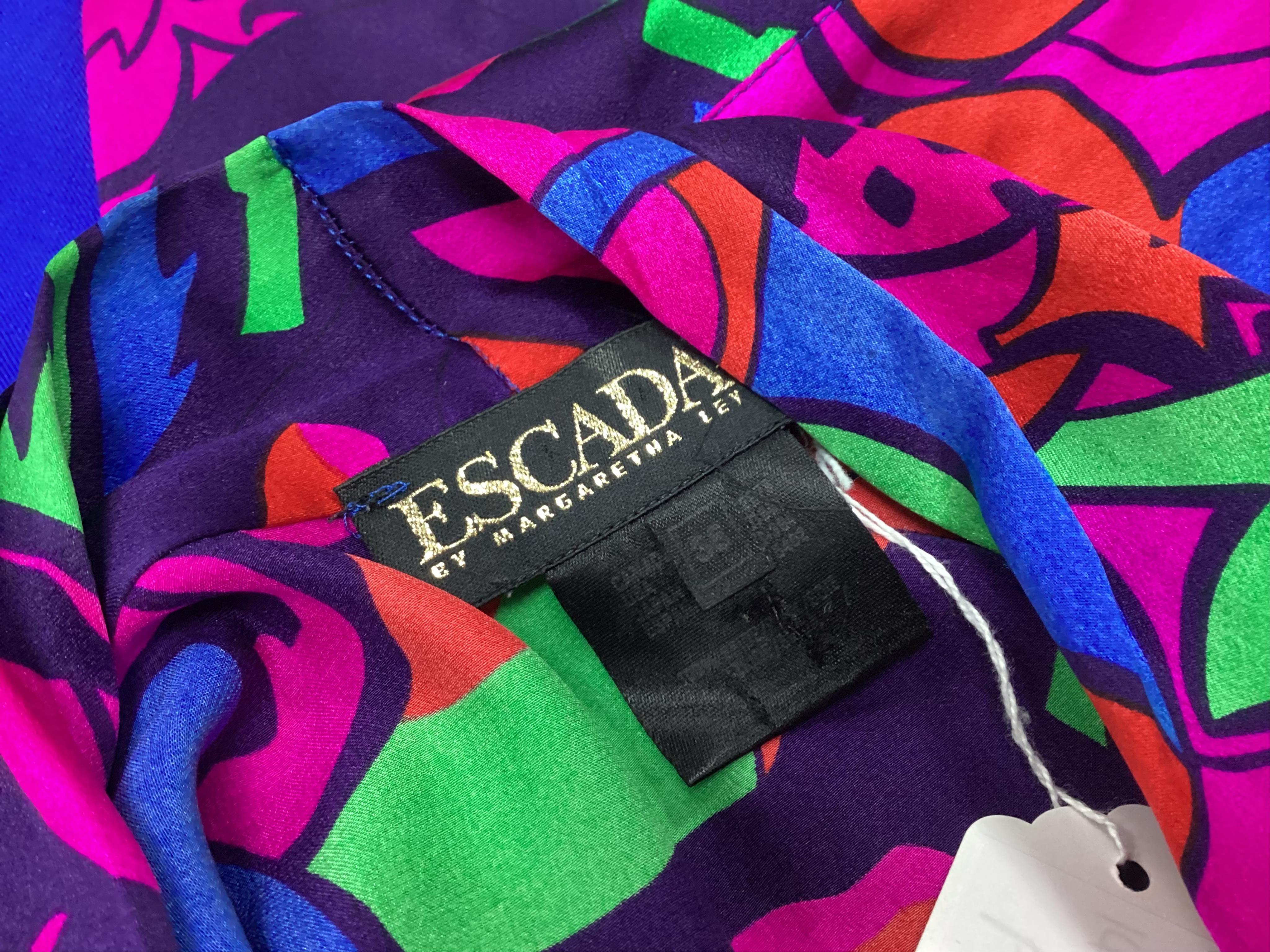 Two Escada skirts and a multi colour silk body blouse. Proceeds to Happy Paws Puppy Rescue